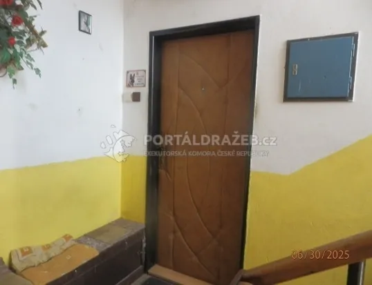 Spoluvlastnický podíl ve výši 1/2 na rodinném domu v obci Pavlíkov, okres Rakovník