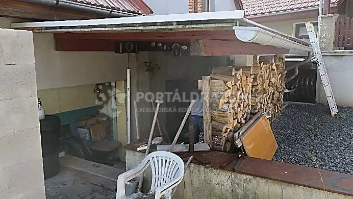 Dražba podílu 1/2 na pozemku a RD v Kelči