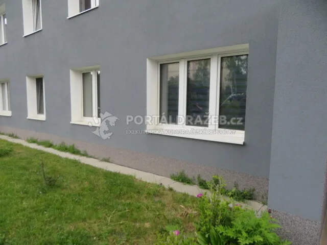Bytová jednotka č. 408/2 v Horní Bříze, včetně spoluvlastnického podílu na pozemku