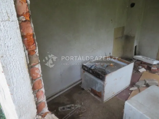 Dražba podílu id. 1/2 na objektu v obci Praha, k.ú. Suchdol