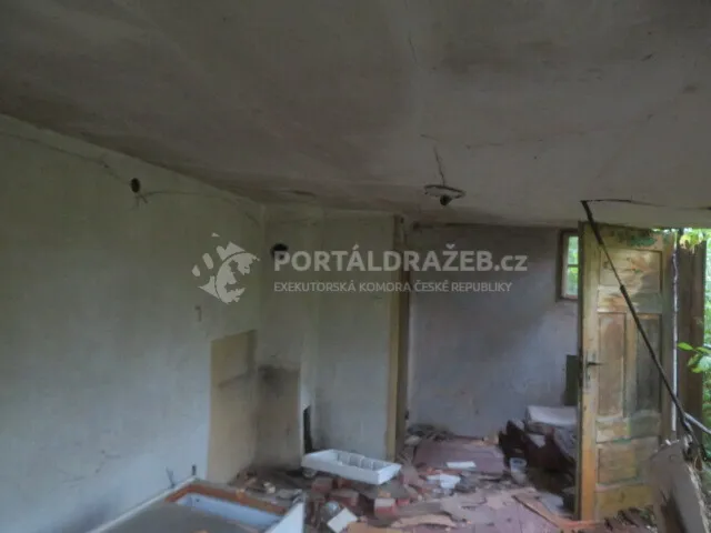 Dražba podílu id. 1/2 na objektu v obci Praha, k.ú. Suchdol