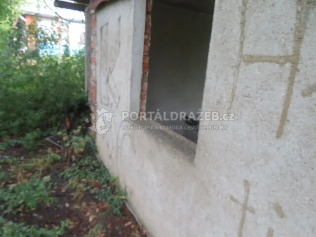 Dražba podílu id. 1/2 na objektu v obci Praha, k.ú. Suchdol