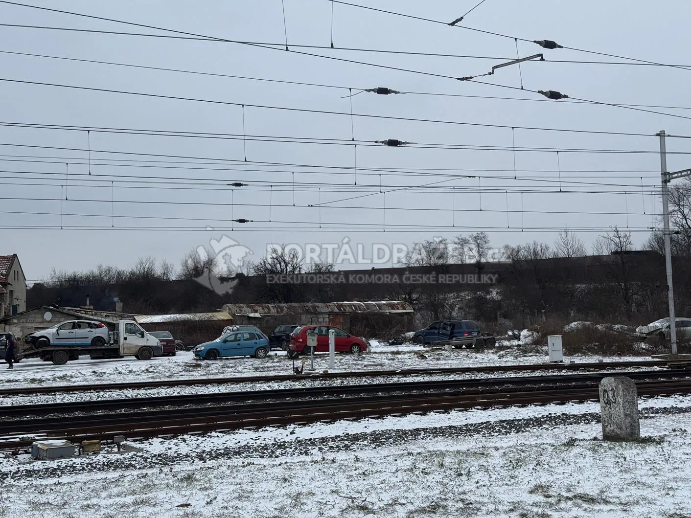 Id. 1/2 bytového domu se 7 byty a pozemky 2 412 m², obec Spomyšl, okr. Mělník