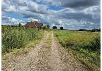 Žemės sklypas 1/2 dalis, 7,5 a. (0,08 ha.) Kauno r. sav. Tvarkiškių k. Vyšnių g. 24