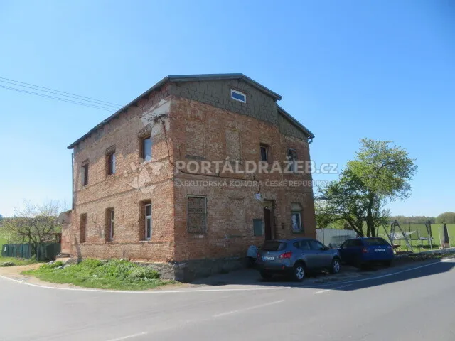 Dražba podílu id. 1/4 na RD v obci Velké Kunětice, okres Jeseník